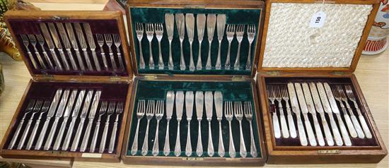 A pair of Sheffield Plate bottle coasters and sundry plate, including three entree dishes and three cased sets of flatware